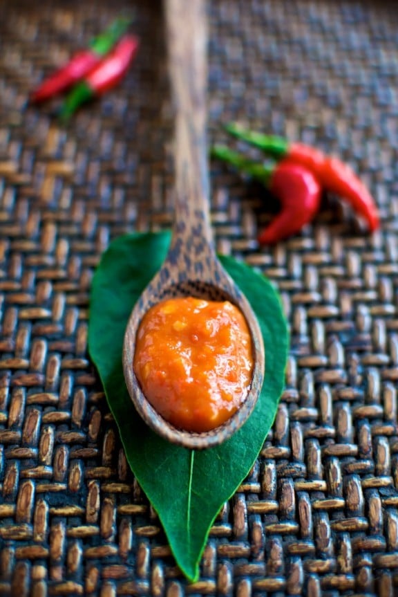 Homemade Sriracha Chili Hot Sauce on a spoon