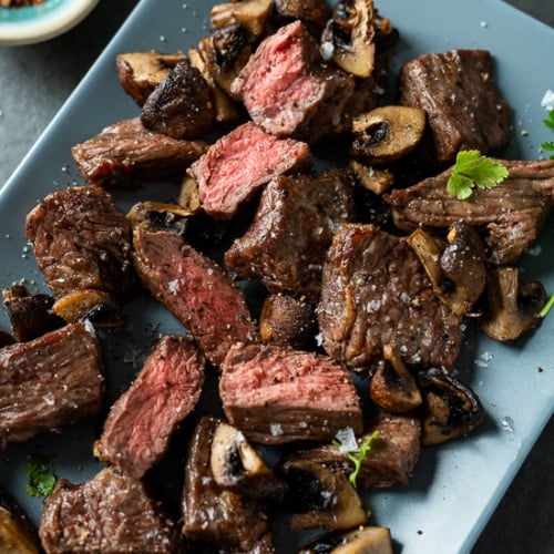 Sirloin steak bites in the Deluxe Air Fryer. Set the air fryer to 400 , Sirloin Steak