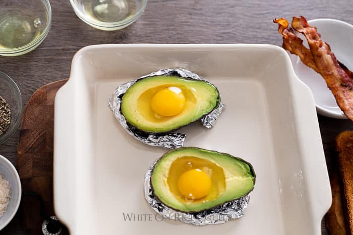 Baked Eggs in Avocado Recipe Paleo Keto @whiteonrice