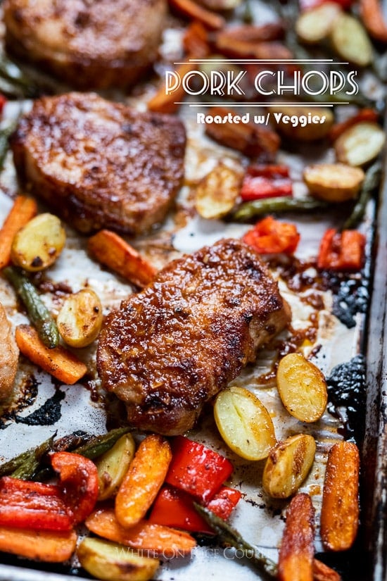 Juicy Baked Pork Chops Recipe with Vegetables on a sheet pan