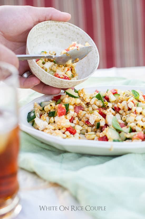 Best Corn Salad scooping into a bowl