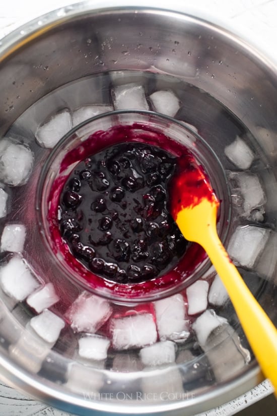 chilled berry mix in ice water by whiteonricecouple.com