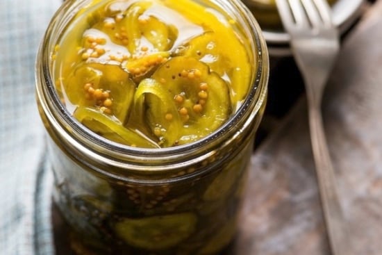 Finished bread and butter pickles in a mason jar
