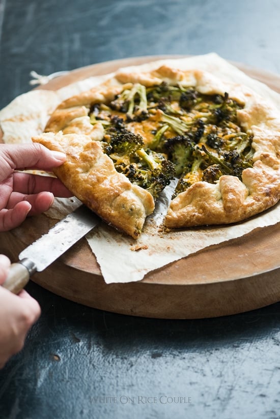 Broccoli Cheddar Galette on a cutting board