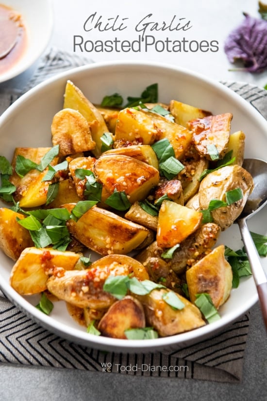 chili garlic roast potatoes in bowl 