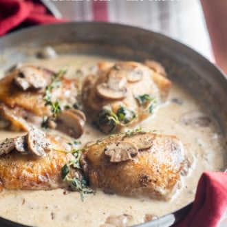 Skillet chicken recipe in creamy garlic mushroom wine sauce | WhiteOnRiceCouple.com