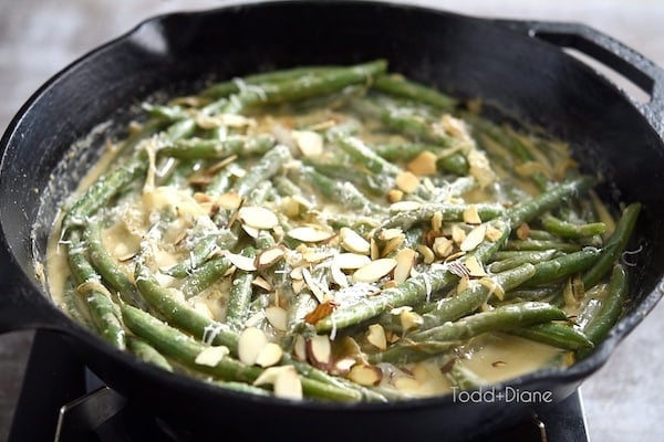 Finished green beans with more parmesan and sliced almonds