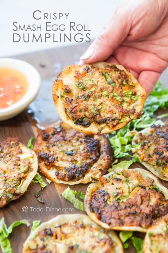 holding a crispy smash egg roll dumpling 