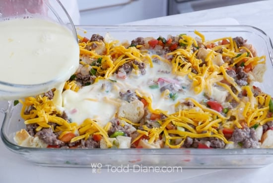 pouring milk egg mixture into baking dish