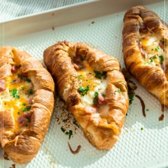 sheet pan tray of croissant egg boats