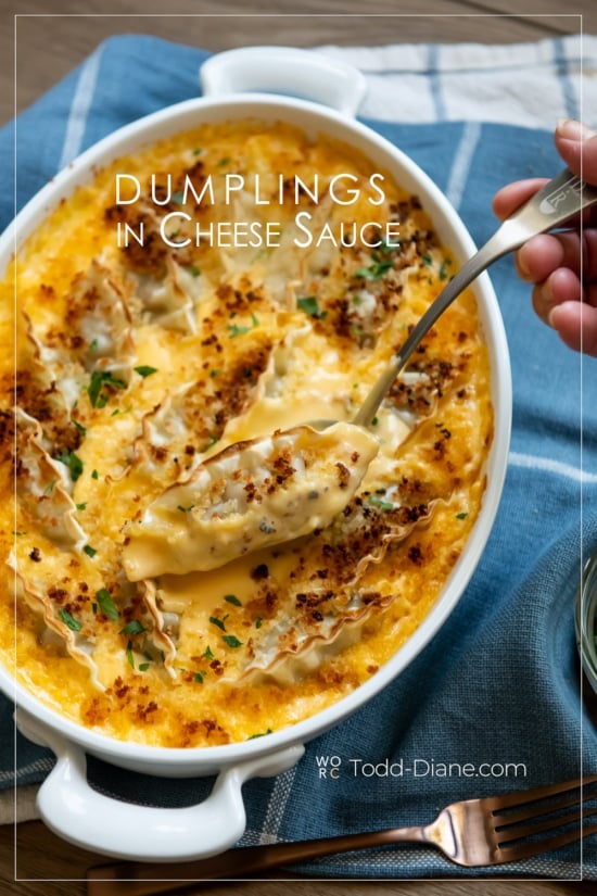 dumpling in cheese sauce with spoon 