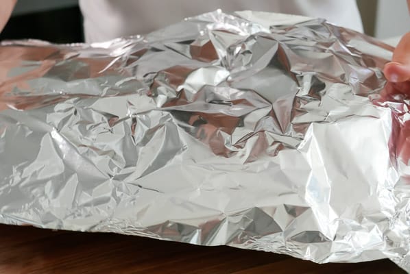 Covering dumplings with foil