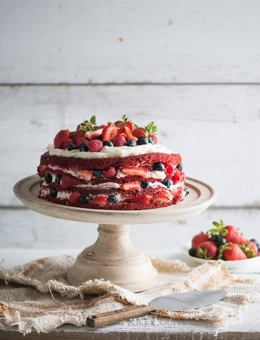 Easy and Moist Red Velvet Cake on a cake stand