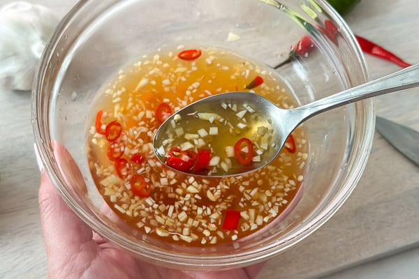 Spoonful of Vietnamese fish sauce dressing