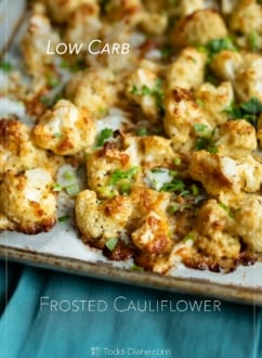 crispy frosted cauliflower with cheese on sheet pan