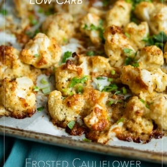 crispy frosted cauliflower with cheese on sheet pan