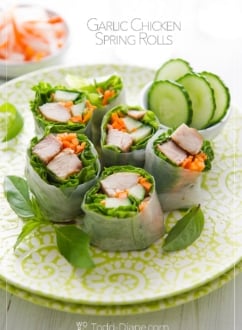 plate of cut garlic chicken spring rolls