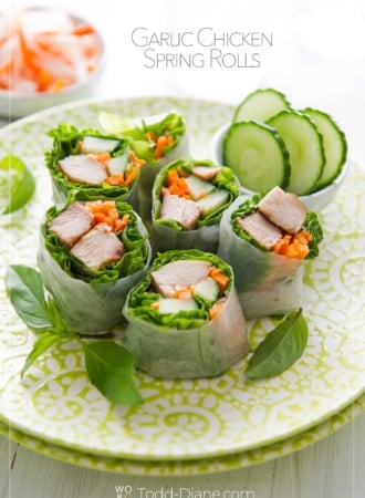 plate of cut garlic chicken spring rolls