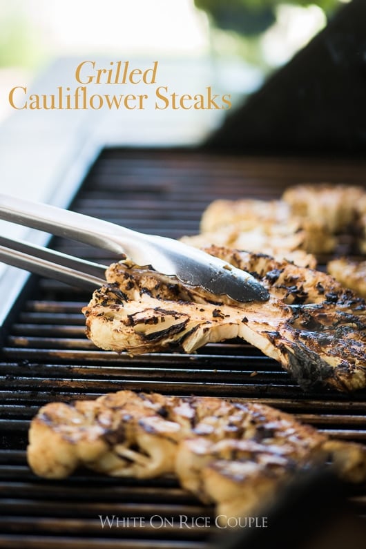 Taking Grilled Cauliflower Steaks off the grill