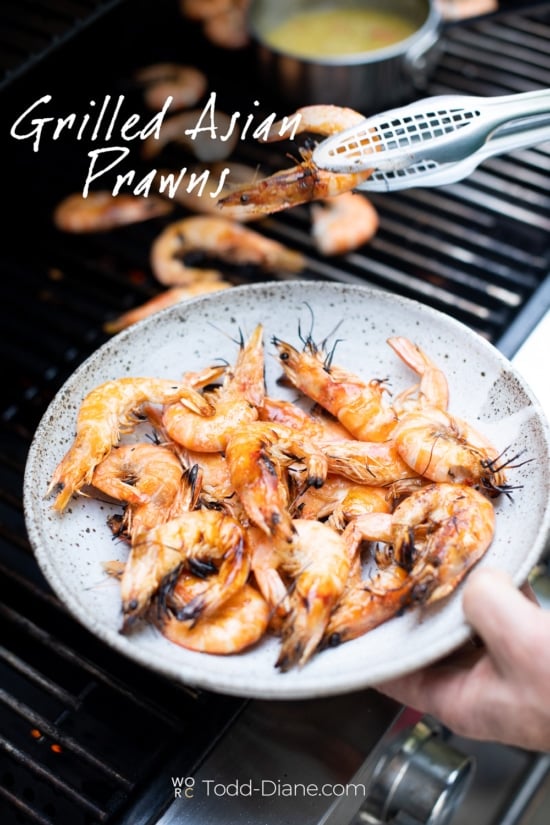 grilled prawns in bowl by white on rice couple