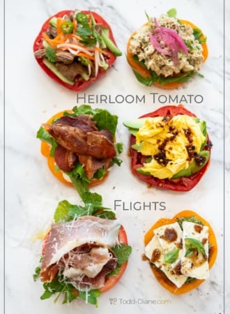 platter of heirloom tomato flights with different toppings