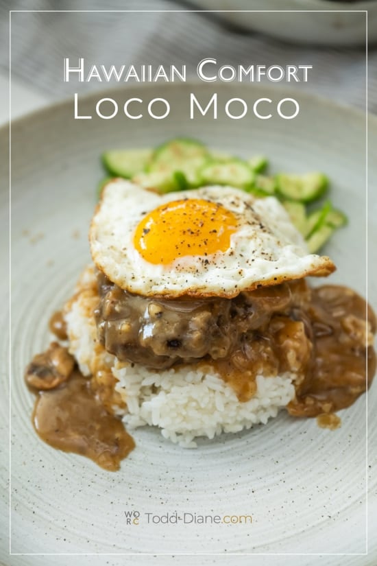 loco moco on plate with cucumber salad
