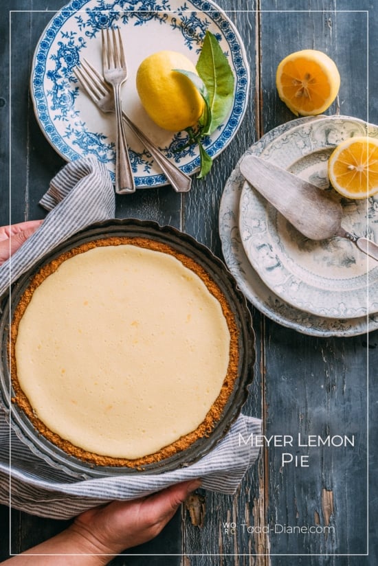 Meyer Lemon Pie Recipe is Favorite Lemon Pie Ever | @whiteonrice Meyer Lemon Pie being set on a table