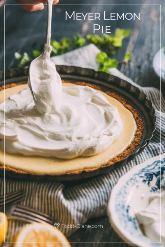 Meyer Lemon Pie Recipe is Favorite Lemon Pie Ever | @whiteonrice Meyer Lemon Pie with whipped cream being spread over the pie