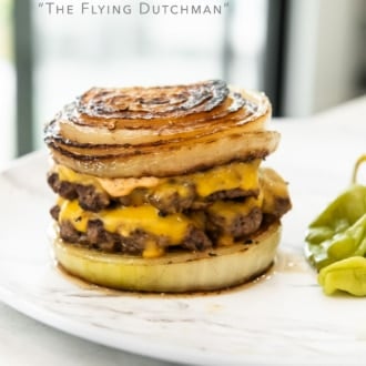onion wrapped flying dutchman burger on plate