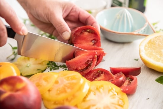 Slicing tomatoes into wedges