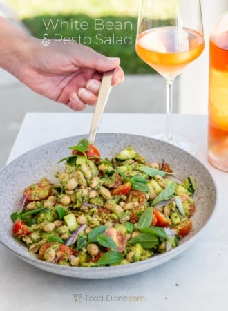 spoon of pesto white bean salad
