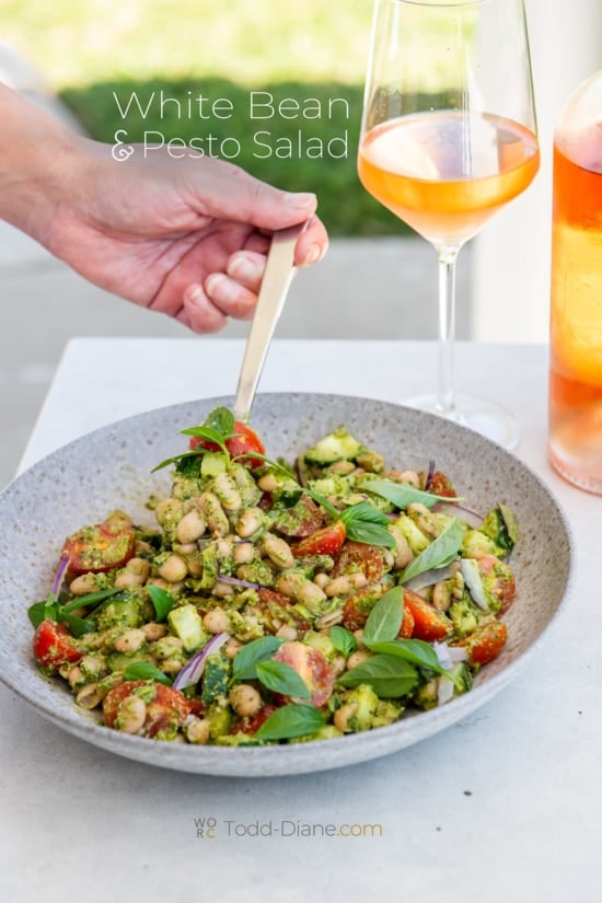 spoon of pesto white bean salad 