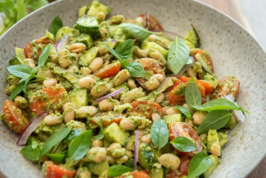 Finished pesto white bean salad in a bowl