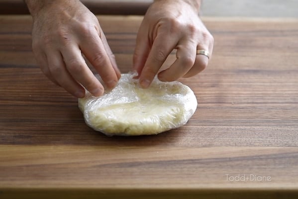 Pie dough wrapped in plastic wrap