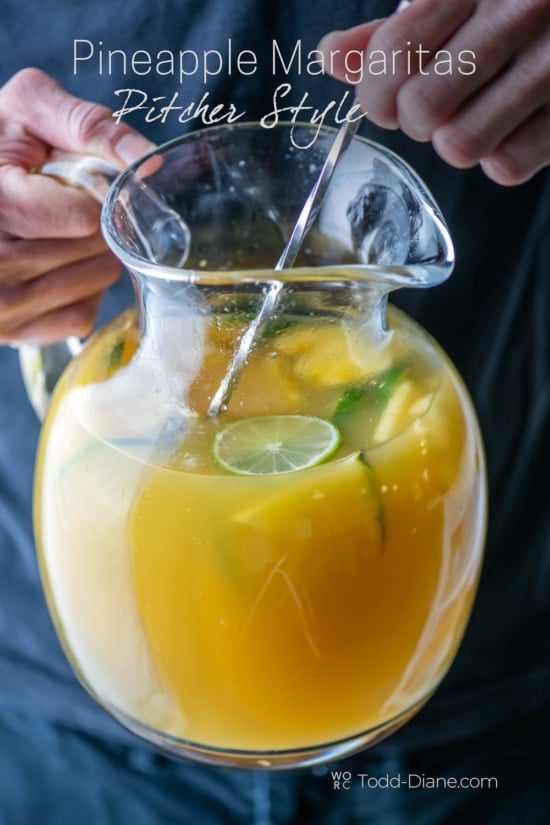 pitcher pineapple margarita stirring 