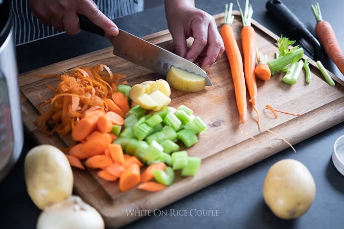 Cutting veggies for Slow Cooker Beef Stew Recipe in Instant Pot @whiteonrice