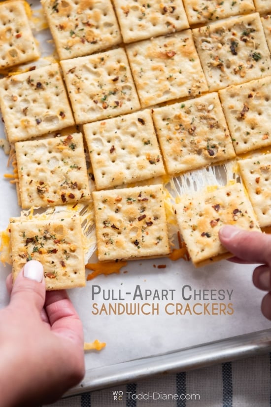 pulling apart cheesy sandwich crackers 