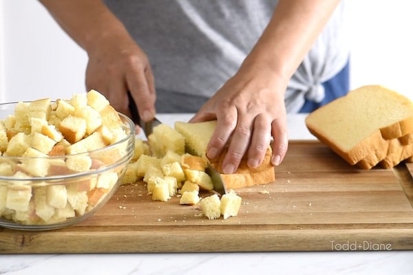 Cutting bread into cubes