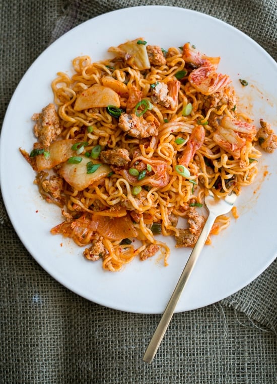 Korean Pork Noodles with Kimchi Pickles on a plate