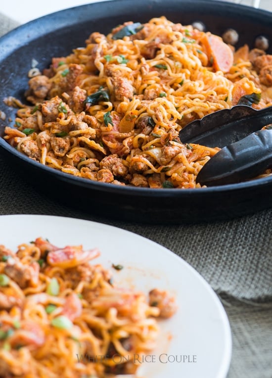 Korean Pork Noodles with Kimchi Pickles in a skillet