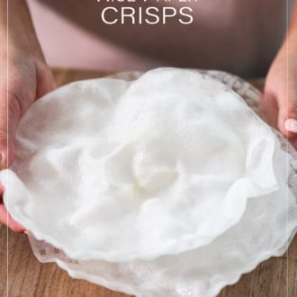 holding whole rice paper crisps