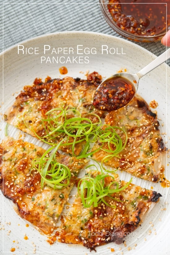 adding chili crisp to rice paper egg roll pancake