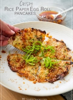 holding a rice papere egg roll pancake slice