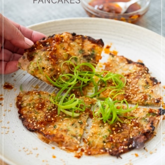 holding a rice papere egg roll pancake slice