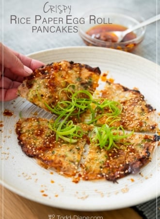 holding a rice papere egg roll pancake slice