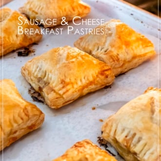 sausage breakfast pastries on a sheet pan in oven