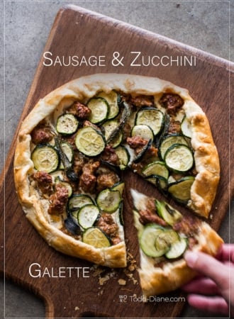 Sausage and Zucchini Galette on a cutting board