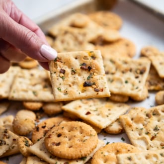 seasoned fire crackers holding a saltine