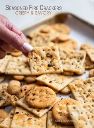 seasoned fire crackers holding a saltine