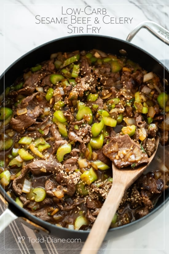 spoon in pot of sesame beef celery stir fry